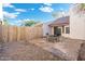Private backyard with a covered patio and low-maintenance landscaping at 1913 S River Dr, Tempe, AZ 85281
