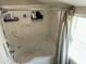 Bathroom with tub, shower, grab bar, shower curtain, and window at 1913 S River Dr, Tempe, AZ 85281