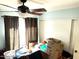 This bedroom features a ceiling fan, natural light, and a neutral color palette for a comfortable living space at 1913 S River Dr, Tempe, AZ 85281