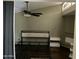 Bedroom featuring a ceiling fan, bedframe and hardwood flooring at 1913 S River Dr, Tempe, AZ 85281