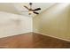 Spacious bedroom featuring hardwood floors and ample natural light at 1913 S River Dr, Tempe, AZ 85281