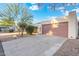 Charming single-story home with a private driveway and desert landscaping, offering convenient parking and curb appeal at 1913 S River Dr, Tempe, AZ 85281