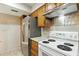 Efficient kitchen with appliances and ample cabinet space, perfect for preparing delicious meals with ease at 1913 S River Dr, Tempe, AZ 85281
