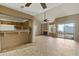 Open concept living room with tile flooring and access to outdoor patio at 1913 S River Dr, Tempe, AZ 85281