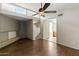 Open-concept living room featuring hardwood floors and clerestory windows at 1913 S River Dr, Tempe, AZ 85281