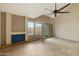 Inviting living room features fireplace, tile floors, and sliding glass doors at 1913 S River Dr, Tempe, AZ 85281
