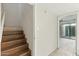 Staircase with wood treads leading to the upper level of the home at 1913 S River Dr, Tempe, AZ 85281