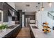 Spacious kitchen with a large island, stainless steel appliances, and open layout, perfect for cooking and entertaining at 1956 W Kinfield Trl, Phoenix, AZ 85085