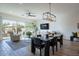 Open-concept living area flows seamlessly into a dining space and backyard access, ideal for entertaining at 1956 W Kinfield Trl, Phoenix, AZ 85085