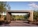 Outdoor seating area with modern design, offering a peaceful spot with mountain views at 1956 W Kinfield Trl, Phoenix, AZ 85085