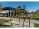 Playground and picnic area in the community, perfect for Gathering gatherings and outdoor entertainment at 1956 W Kinfield Trl, Phoenix, AZ 85085