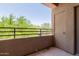 This inviting balcony offers a peaceful retreat with views of the verdant surroundings at 20100 N 78Th Pl # 2114, Scottsdale, AZ 85255