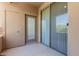 Private balcony featuring a door, large sliding glass door, and scenic views at 20100 N 78Th Pl # 2114, Scottsdale, AZ 85255