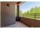 This cozy balcony offers a tranquil outdoor retreat and scenic views of the surrounding lush greenery at 20100 N 78Th Pl # 2114, Scottsdale, AZ 85255