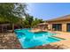 Bright pool area with seating, sun loungers, shade, and a cool refreshing swimming pool at 20100 N 78Th Pl # 2114, Scottsdale, AZ 85255