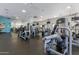 Modern fitness center filled with state-of-the-art exercise equipment, providing a comprehensive workout space for residents at 20100 N 78Th Pl # 2114, Scottsdale, AZ 85255