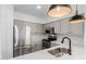Well-lit kitchen boasts stainless steel appliances, ample counter space, and undermount sink at 20100 N 78Th Pl # 2114, Scottsdale, AZ 85255