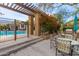 Relaxing outdoor dining area located next to the community pool at 20100 N 78Th Pl # 2114, Scottsdale, AZ 85255