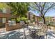 Outdoor grill area with seating, offering a relaxing space for residents to barbecue and enjoy the outdoors at 20100 N 78Th Pl # 2114, Scottsdale, AZ 85255