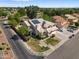 Corner lot home with desert landscaping, two-car garage, and solar panels at 2024 N 125Th Ave, Avondale, AZ 85392