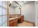 Bathroom featuring double sinks with granite counters at 2024 N 125Th Ave, Avondale, AZ 85392