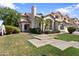 Two-story home with well-maintained lawn and desert landscaping at 2024 N 125Th Ave, Avondale, AZ 85392