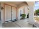 Front porch with a double door entry and stucco columns at 2024 N 125Th Ave, Avondale, AZ 85392