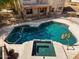 Inviting backyard pool and spa combo offer refreshing relaxation, and outdoor enjoyment at 2024 N 125Th Ave, Avondale, AZ 85392