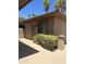 View of the home's exterior showing private entrance and well maintained landscaping at 20332 N Denizen Dr, Surprise, AZ 85387