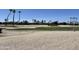 Scenic view of the lush green golf course with community homes in the background at 20332 N Denizen Dr, Surprise, AZ 85387