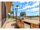 Outdoor kitchen featuring stainless steel grill and prep area at 20332 N Denizen Dr, Surprise, AZ 85387