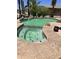 Beautiful in-ground pool featuring a spa, rock waterfall, and lush landscaping at 20332 N Denizen Dr, Surprise, AZ 85387