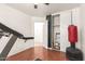 View of bedroom with exercise equipment, including a treadmill, with laminate flooring at 2202 S Lawther Dr, Apache Junction, AZ 85120
