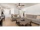 Spacious living room showcases tile floors, comfortable seating, and bright natural light at 2202 S Lawther Dr, Apache Junction, AZ 85120