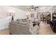 Comfortable living room with tile floors, neutral-toned sofas, and an open layout at 2202 S Lawther Dr, Apache Junction, AZ 85120