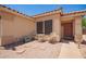 Cozy front patio features comfortable seating, offering a relaxing outdoor space at 2202 S Lawther Dr, Apache Junction, AZ 85120