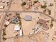 Large property featuring a well-maintained home and a sprawling desert landscape at 22414 W Meade Ln, Buckeye, AZ 85326