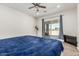 Bright bedroom features a sliding glass door leading to a patio, enhancing natural light at 22414 W Meade Ln, Buckeye, AZ 85326