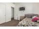 Bedroom features closet and tv at 22414 W Meade Ln, Buckeye, AZ 85326