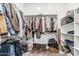 Walk-in closet with shelves and hanging rods offering storage solutions at 22414 W Meade Ln, Buckeye, AZ 85326