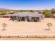 Attractive single-story home with stone accents and a well-maintained front yard at 22414 W Meade Ln, Buckeye, AZ 85326