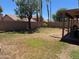 Expansive backyard with a block fence and plenty of space for outdoor activities at 2723 E Rockledge Rd, Phoenix, AZ 85048