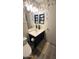 Charming bathroom with blue vanity, patterned wallpaper, and a decorative rug at 2723 E Rockledge Rd, Phoenix, AZ 85048