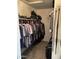 Walk-in closet providing ample storage and organization solutions at 2723 E Rockledge Rd, Phoenix, AZ 85048