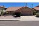 Charming single-story home featuring a well-maintained yard and a two-car garage at 2723 E Rockledge Rd, Phoenix, AZ 85048