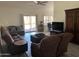 Comfortable living room area with neutral tones and sliding doors to outdoor area at 2723 E Rockledge Rd, Phoenix, AZ 85048