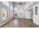 Airy living room features abundant windows, loft space and wood-look floors at 3025 E Fremont Rd, Phoenix, AZ 85042