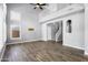 Bright living room with wood floors, staircase and a view of loft area at 3025 E Fremont Rd, Phoenix, AZ 85042