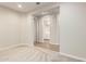 Bedroom with neutral walls, carpet flooring and view to bathroom at 32611 N 20Th Dr, Phoenix, AZ 85085