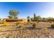 Stone monument with metal sign for Copperleaf community with desert landscaping at 32611 N 20Th Dr, Phoenix, AZ 85085
